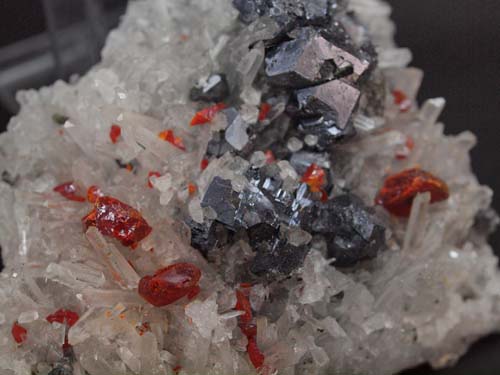 Quartz crystals with realgar (realgar crystal size 1cm) and galena crystals on it<br>Size 7cm x 8cm x 3,5cm