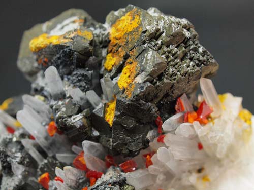 Quartz crystals with realgar crystals on it and sphalerite crystals (Sphalerite crystal 3x3 cm).<br>Size 7cm x 7cm x 4cm