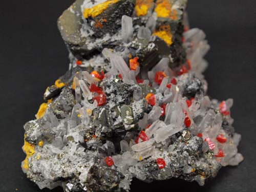 Quartz crystals with realgar crystals on it and sphalerite crystals (Sphalerite crystal 3x3 cm).<br>Size 7cm x 7cm x 4cm