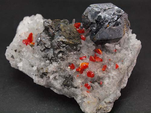 Quartz crystals with realgar crystals on it and galena (galena crystal size 1,5x2 cm) and sphalerite crystals.<br>Size 4cm x 5,8cm x 2cm