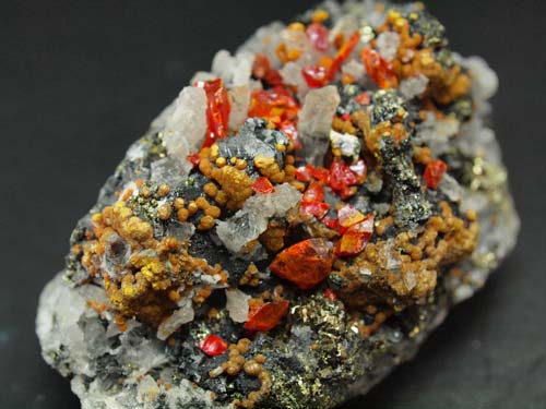 Quartz crystals with orpiment and realgar (realgar crystal size 0,5cm) crystals on it and sphalerite crystals.<br>Size 4cm x 6,5cm x 4cm